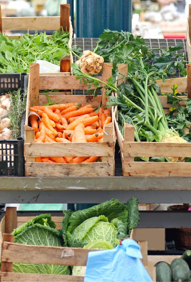Farm to table fresh vegetables in wood crates