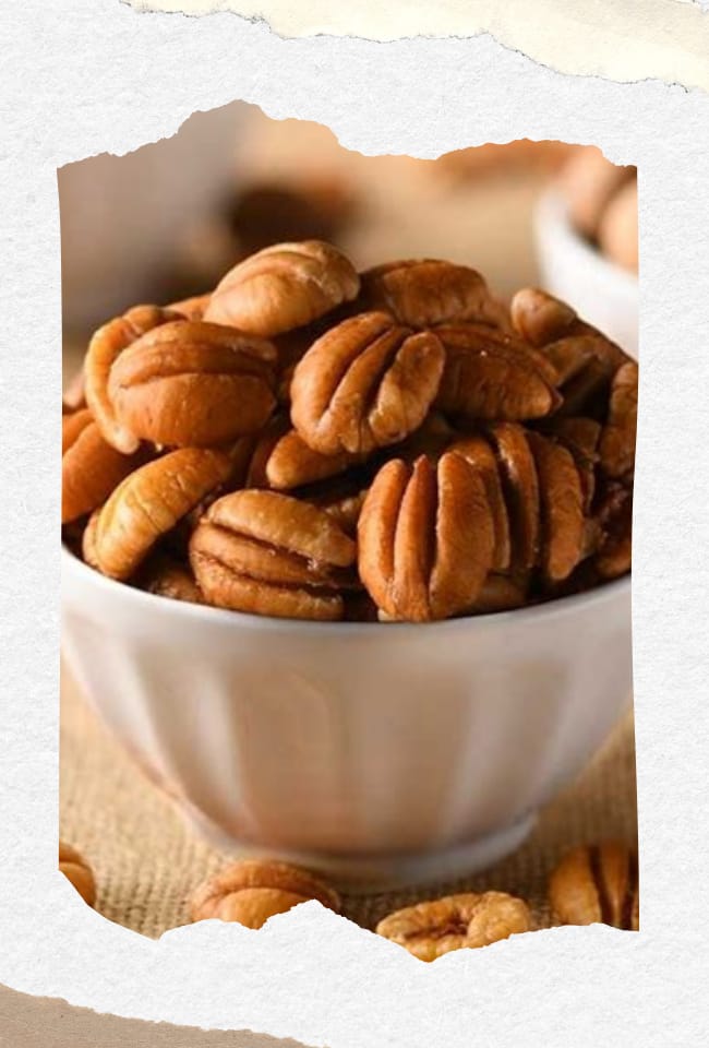 shelled pecans in a white china bowl